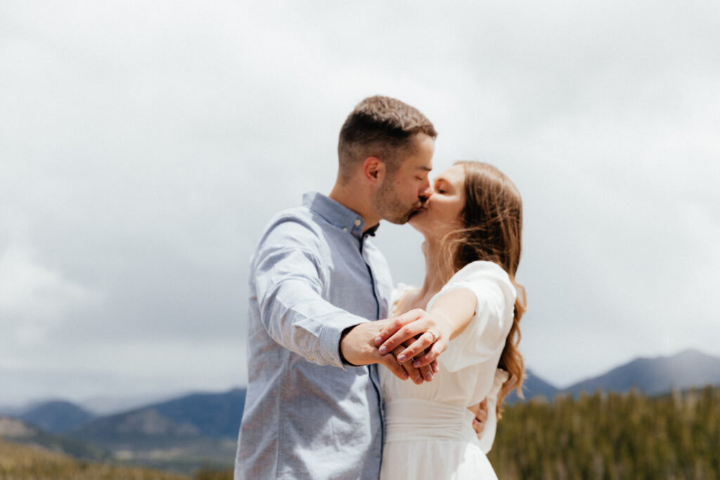 Hiking engagement session in Rocky Mountain National Park at Dream Lake