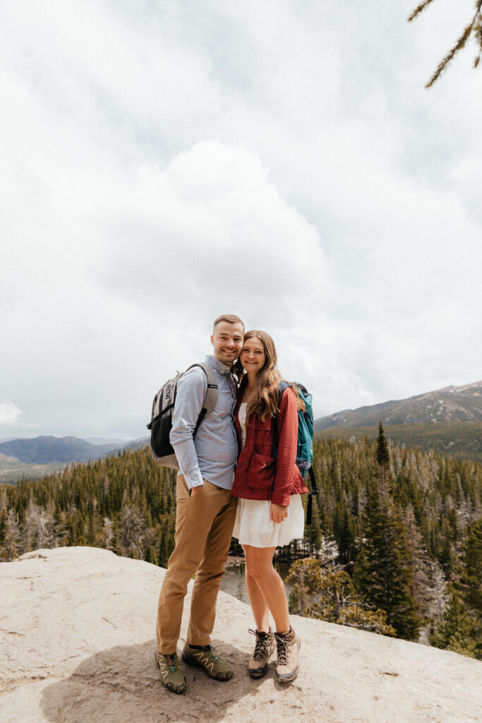 Hiking engagement session in Rocky Mountain National Park at Dream Lake