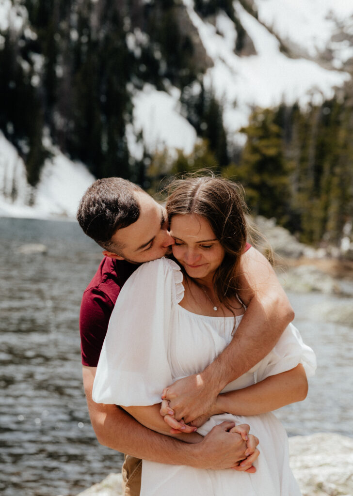 Hiking engagement session in Rocky Mountain National Park at Dream Lake