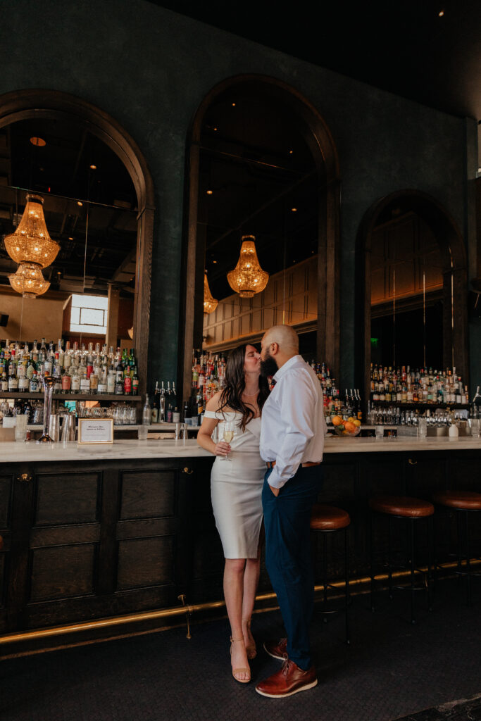 Unique engagement session at a rooftop bar in downtown Denver, Colorado