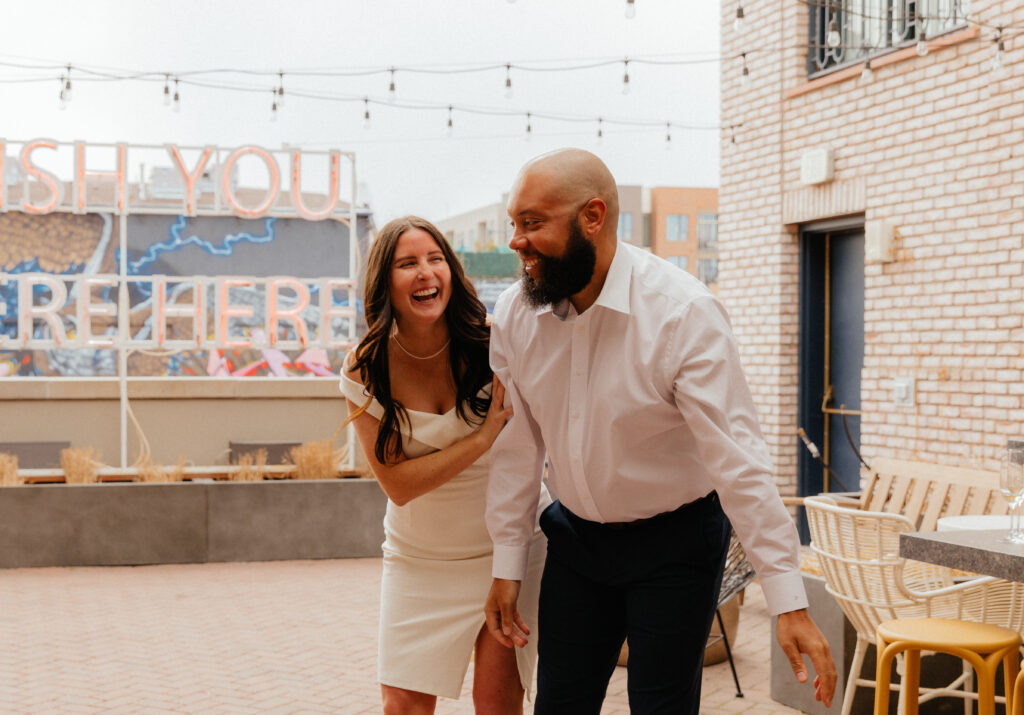 Unique engagement session at a rooftop bar in downtown Denver, Colorado