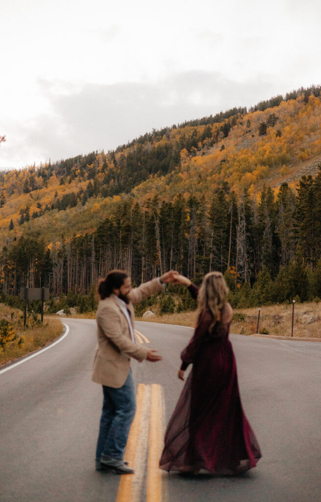 Fall elopement in Rocky Mountain National Park, couple road photos