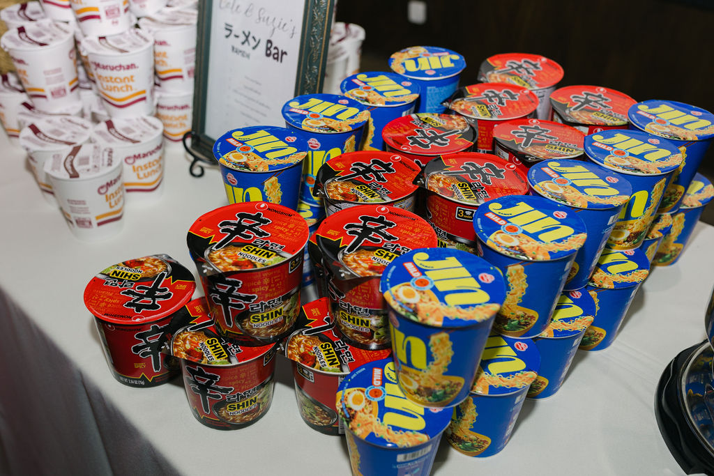 Ramen bar setup with colorful cups for late-night Villa Parker wedding snack.