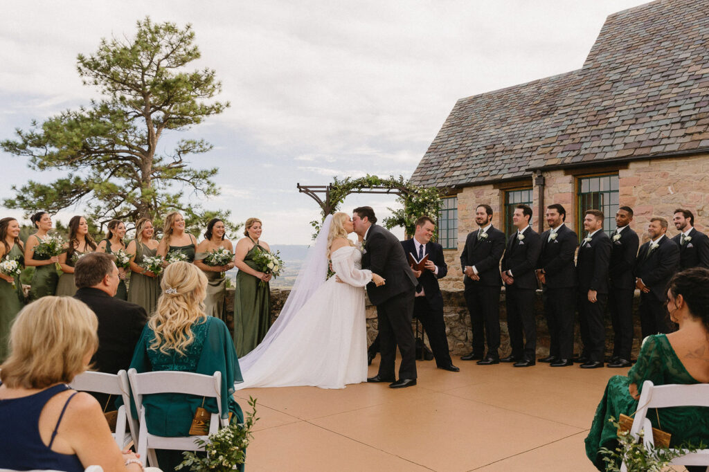 first kiss at cherokee ranch and castle wedding