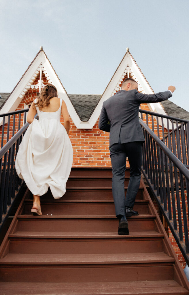 bride and groom celebrating at berthoud wedding venue