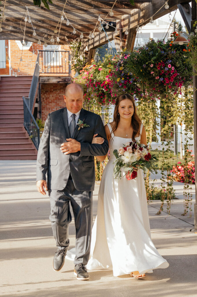 Brookeside Gardens Event Center bride and dad at ceremony