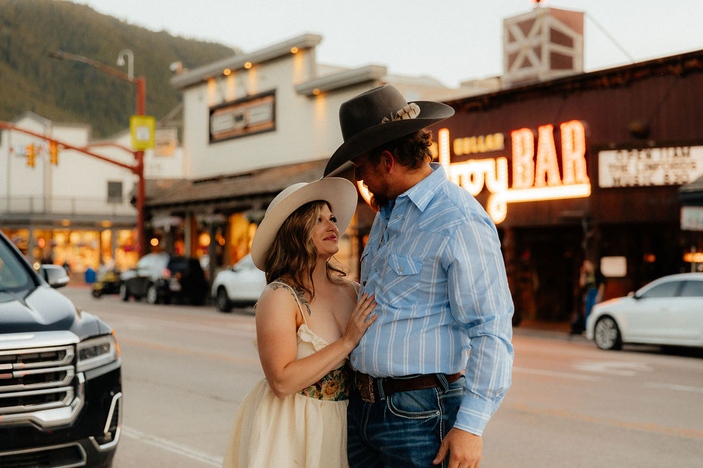 Vintage, western engagement photos at the Million Dollar Cowboy Bar in Jackson Hole