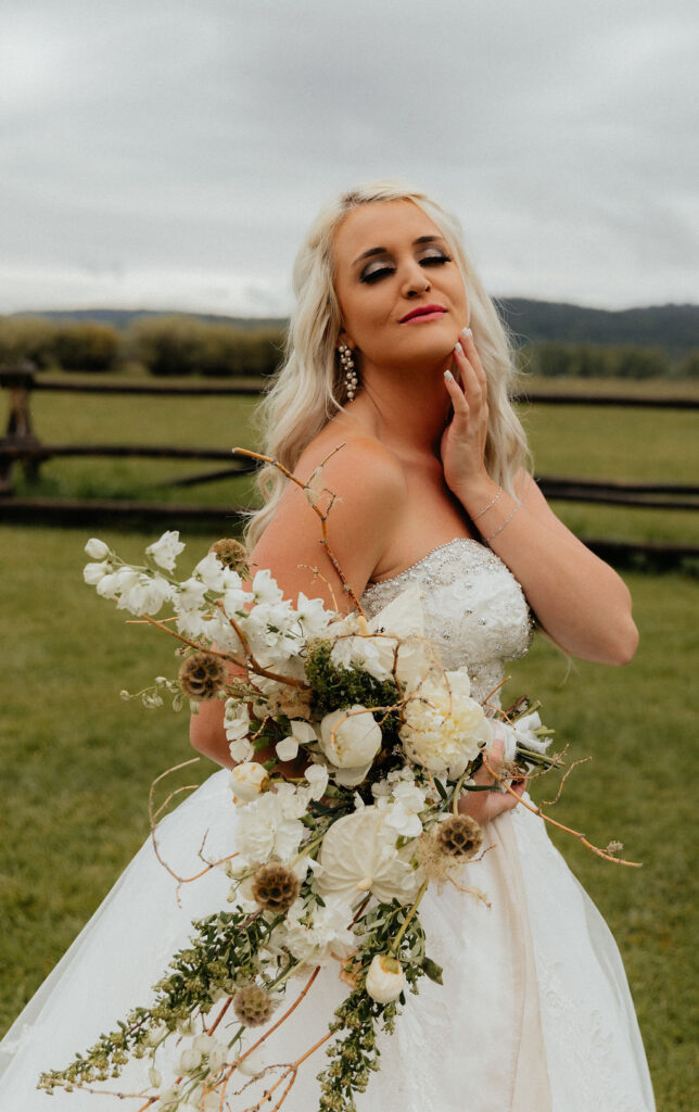 Moody bridal portraits in Jackson Hole, Wyoming at Diamond Cross Ranch