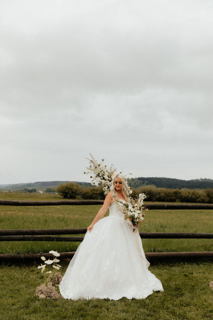 Moody bridal portraits in Jackson Hole, Wyoming at Diamond Cross Ranch