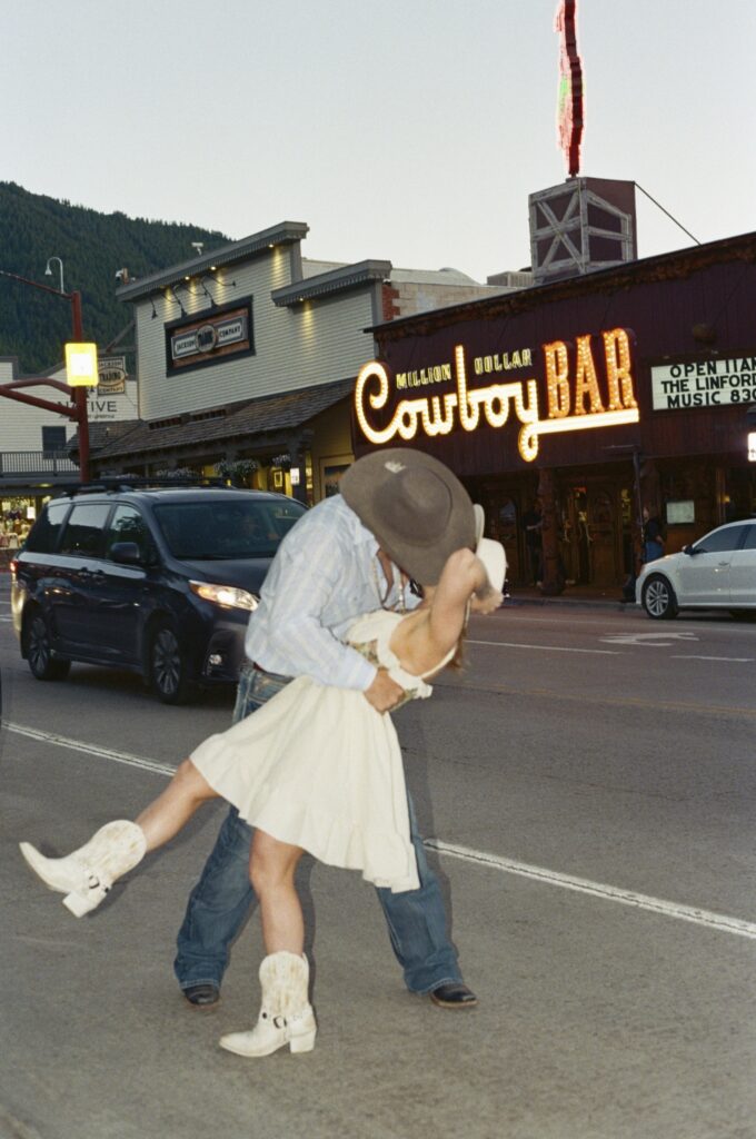 Vintage, western engagement photos at the Million Dollar Cowboy Bar in Jackson Hole