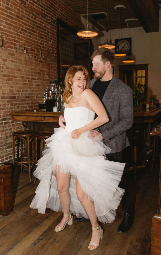 Vintage cocktail bar engagement photos in Denver