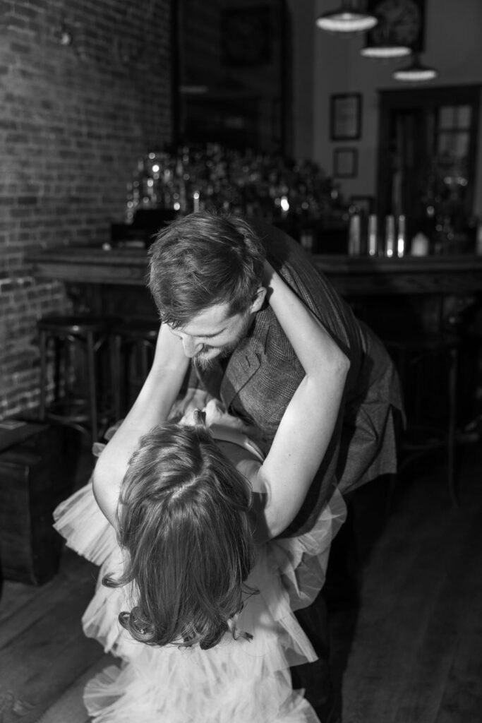 Vintage cocktail bar engagement photos in Denver