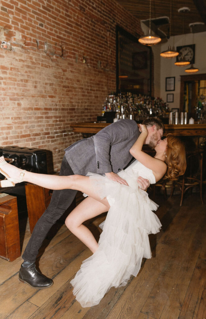 Vintage cocktail bar engagement photos in Denver