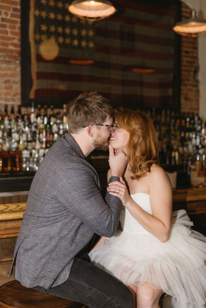 Vintage cocktail bar engagement photos in Denver