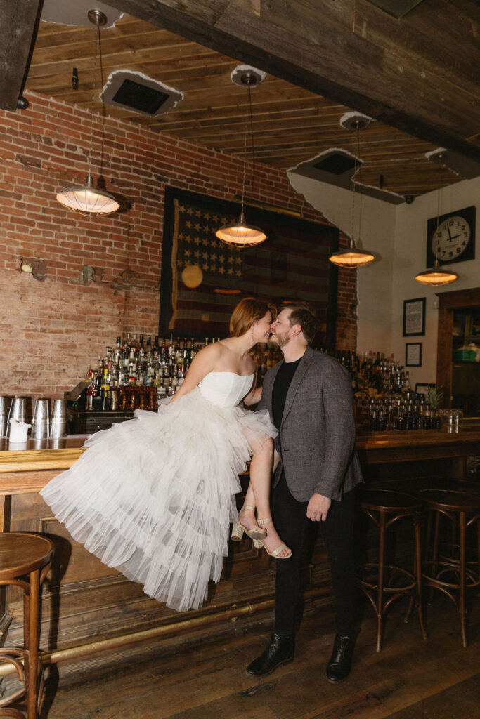 Vintage cocktail bar engagement photos in Denver