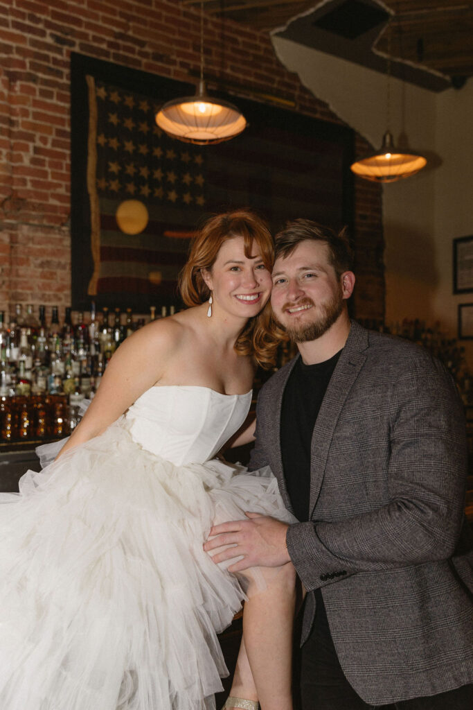 Vintage cocktail bar engagement photos in Denver