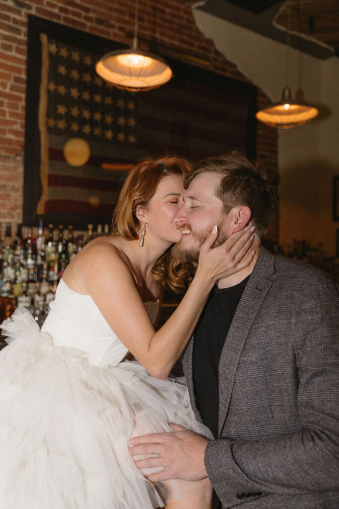 Vintage cocktail bar engagement photos in Denver