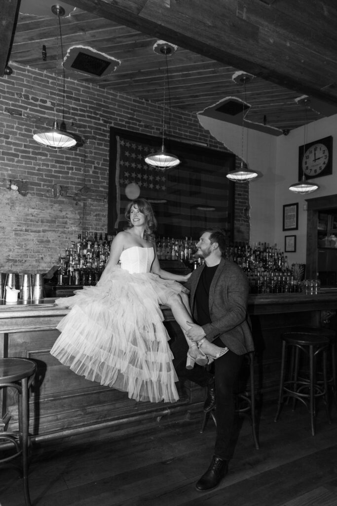 Vintage cocktail bar engagement photos in Denver