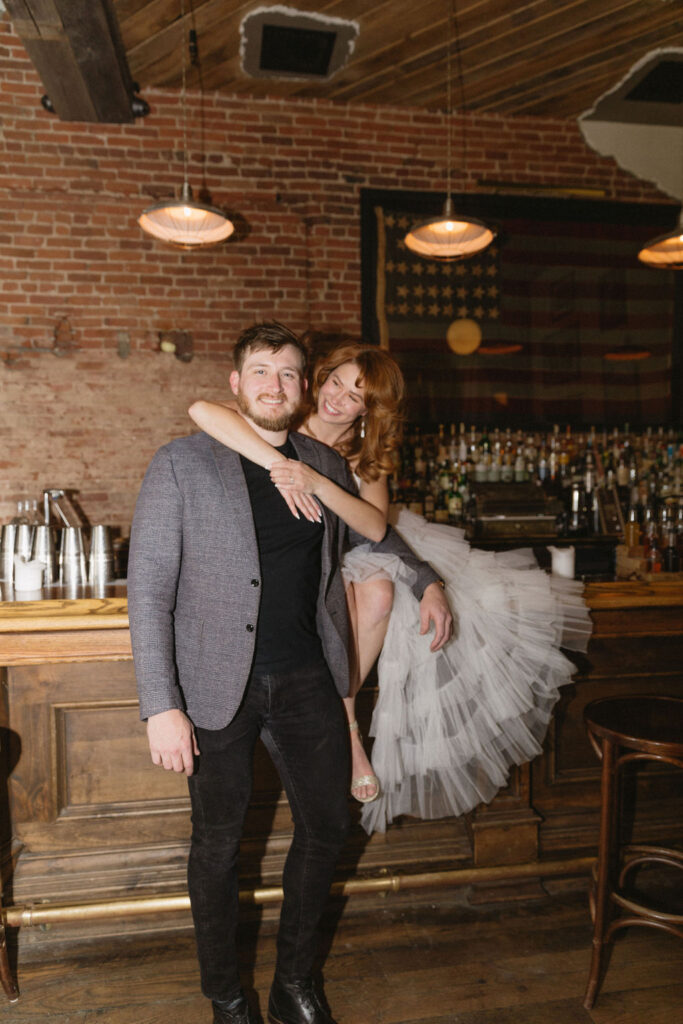 Vintage cocktail bar engagement photos in Denver