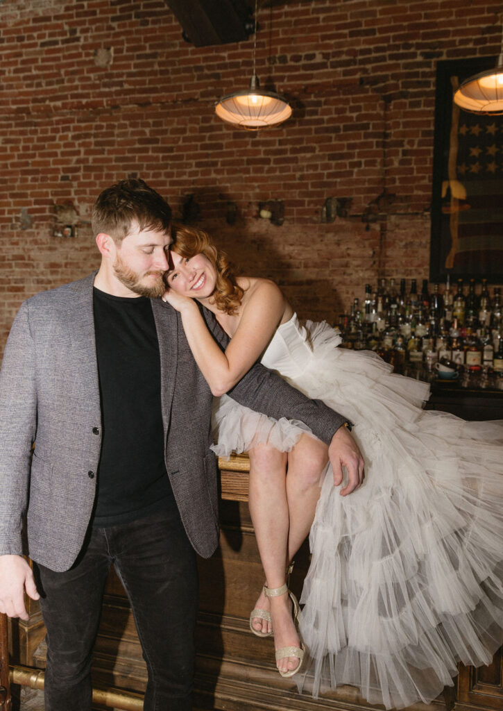 Vintage cocktail bar engagement photos in Denver