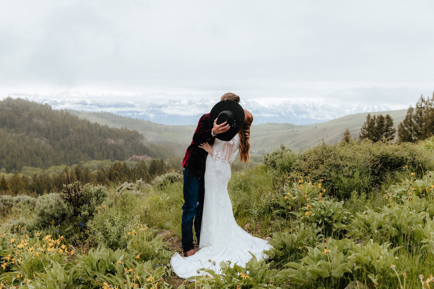 Bride and Groom sharing a kiss at their Wedding Tree elopement in Jackson Hole, Wyoming