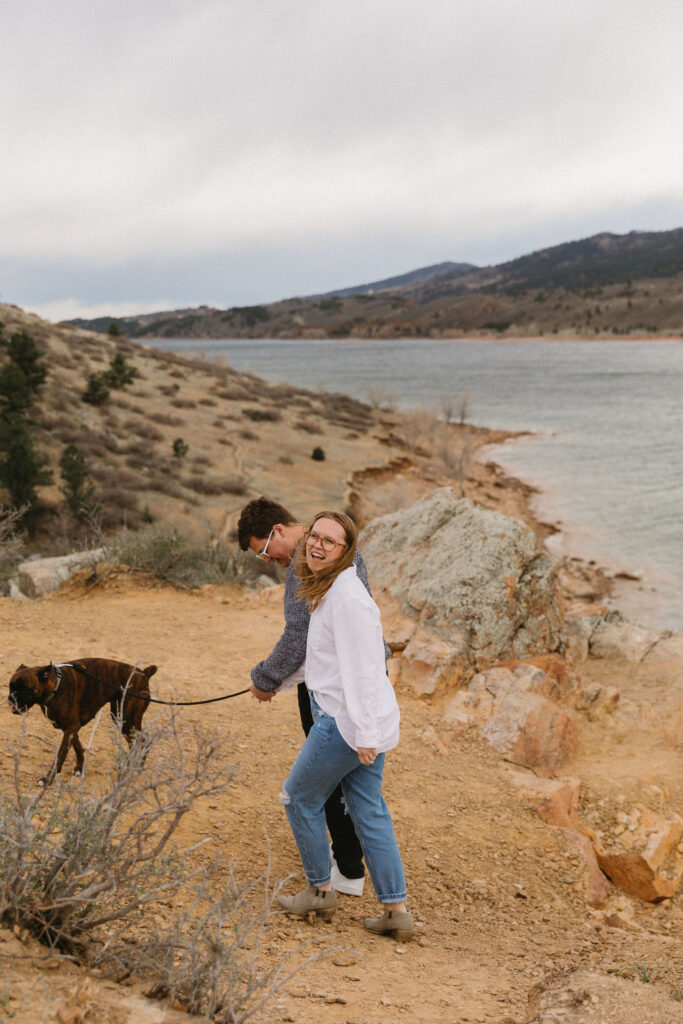 couples photos with their dog at horsetooth reservoir