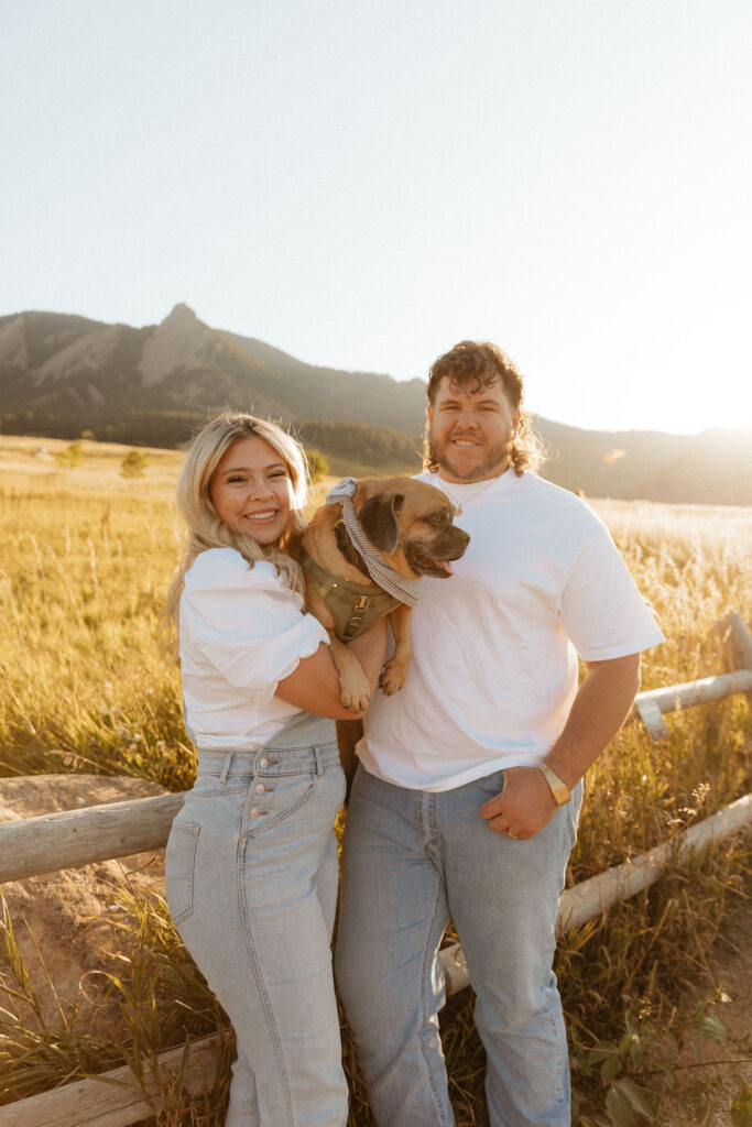 cute rustic engagement photos of a couple in white T shirts and jeans