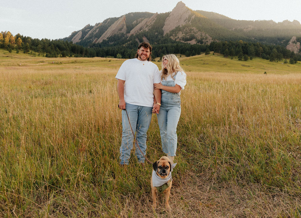 cute rustic engagement photos of a couple in white T shirts and jeans