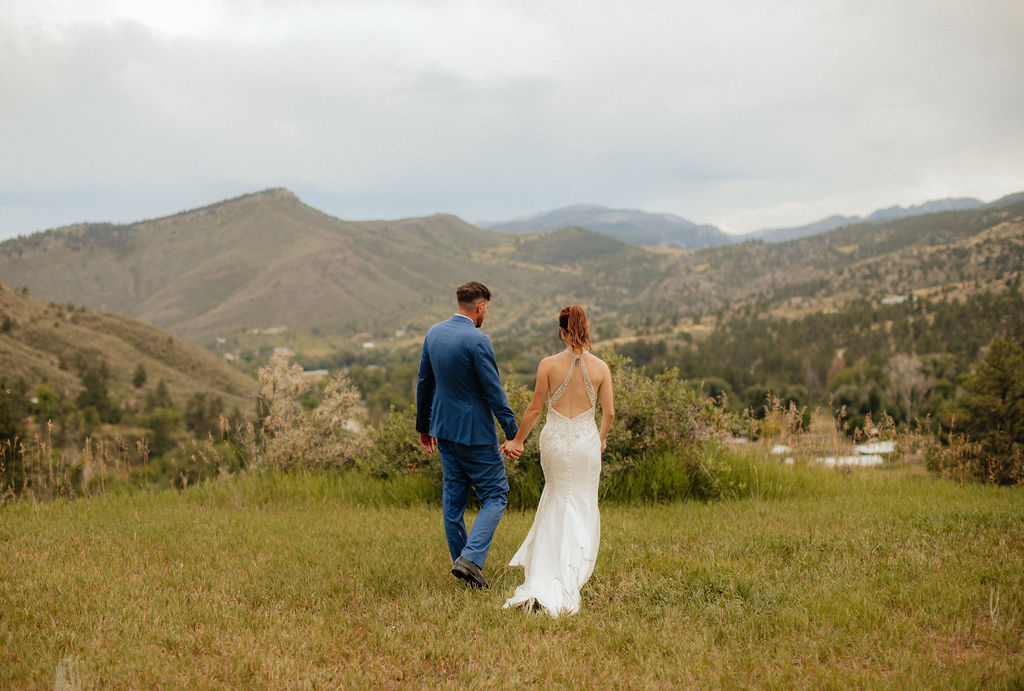 Photo of bride and groom at Stone Mountain Lodge at sunset 