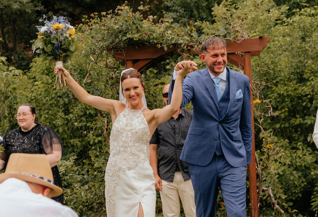 bride and groom leaving their wedding ceremony 