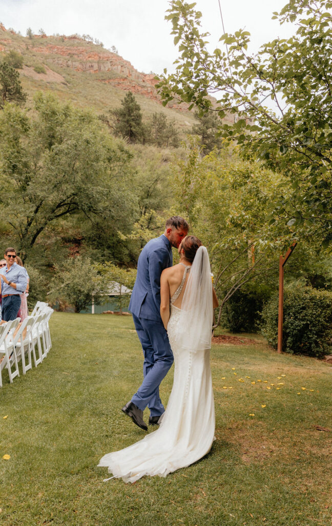 bride and groom leaving their wedding ceremony