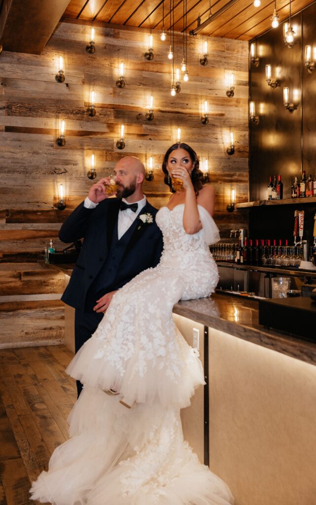 bride and groom photos at the cocktail bar 