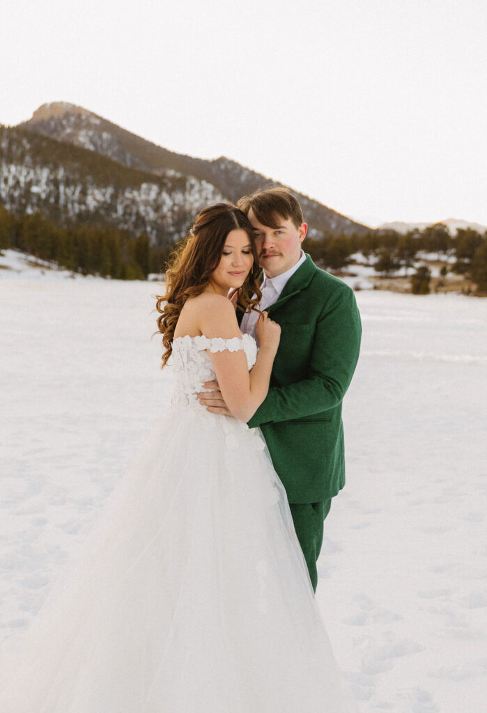 winter wedding photos on a frozen lake