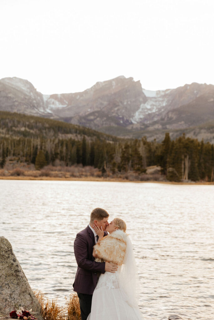 lakeside mountain wedding photos of bride and groom