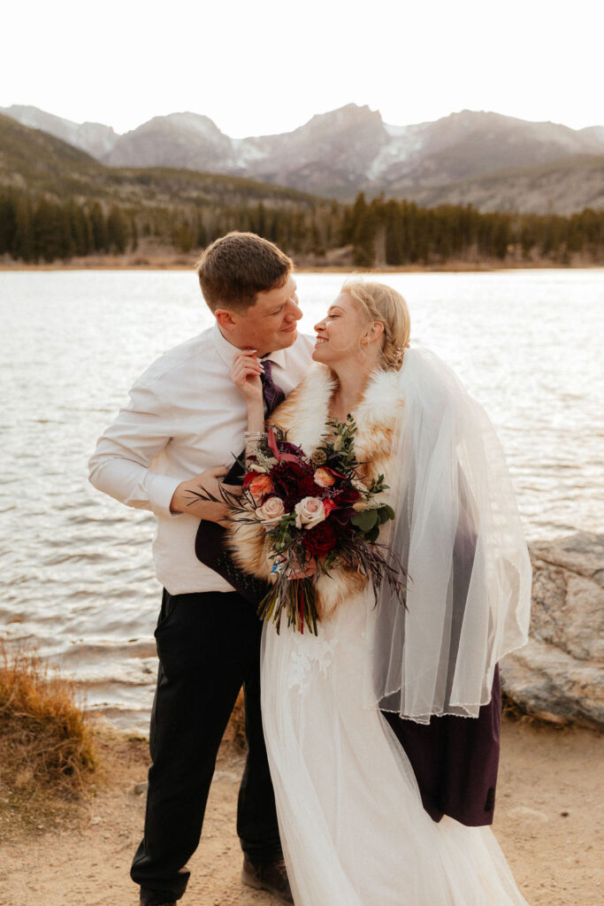 lakeside mountain wedding photos of bride and groom