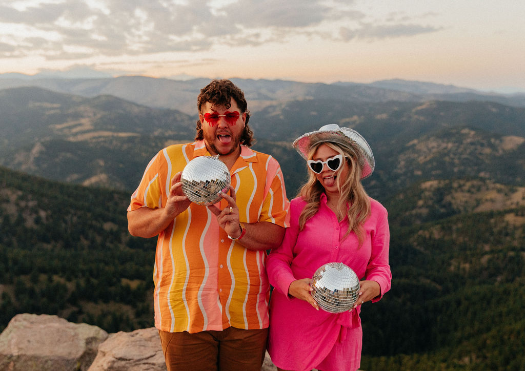 retro vibe lost gulch overlook engagement photos with fun, colorful outfits and mountain views