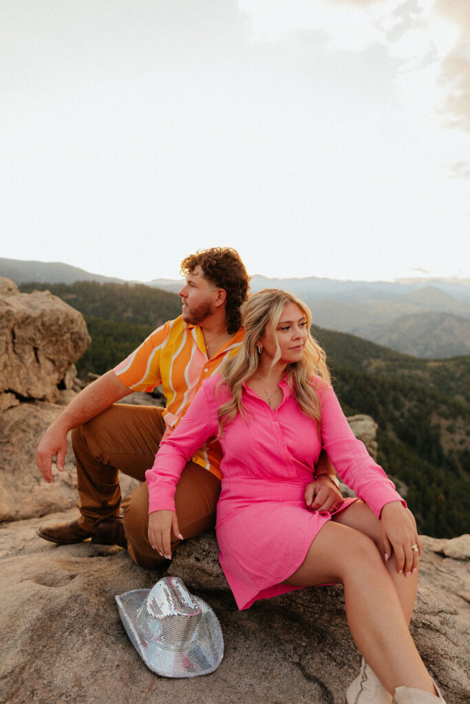 retro vibe lost gulch overlook engagement photos with fun outfits, disco ball and a disco cowboy hat