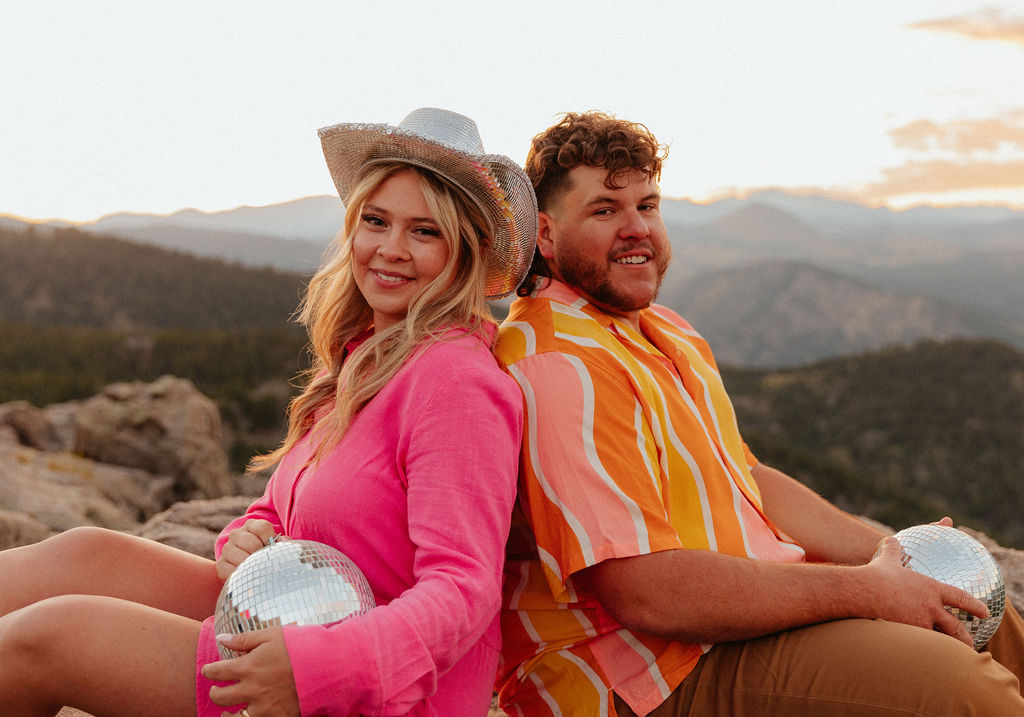 retro vibe lost gulch overlook engagement photos with fun outfits, disco ball and a disco cowboy hat