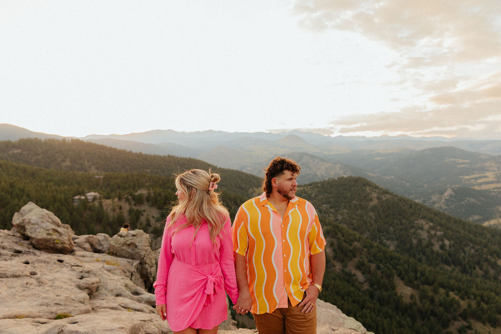 retro vibe lost gulch overlook engagement photos with fun, colorful outfits and mountain views