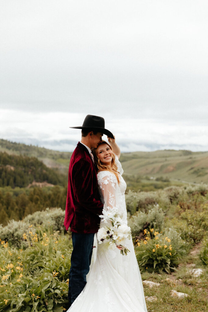 bride and groom jackson hole elopement at the wedding tree