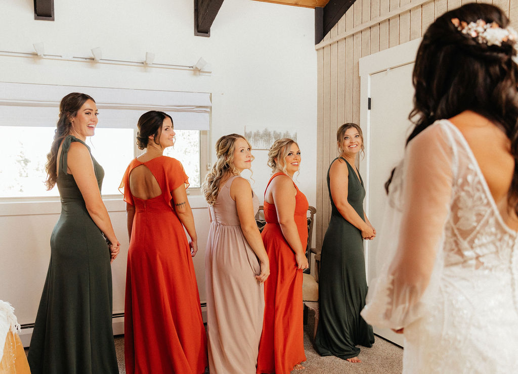 bride and bridesmaids first look