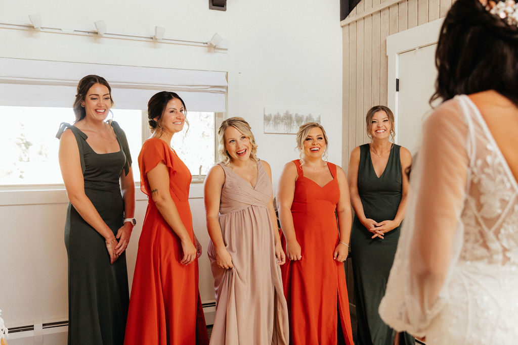 bride and bridesmaids first look