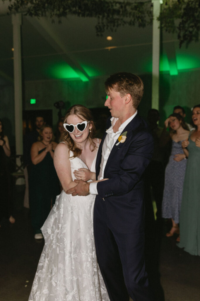 bride and groom dancing and having fun at their wedding reception