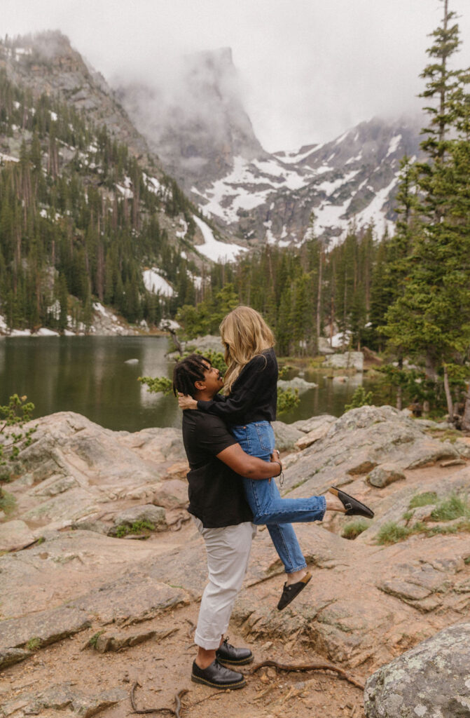 adventurous hiking engagement photos in dream lake, rocky mountain national park