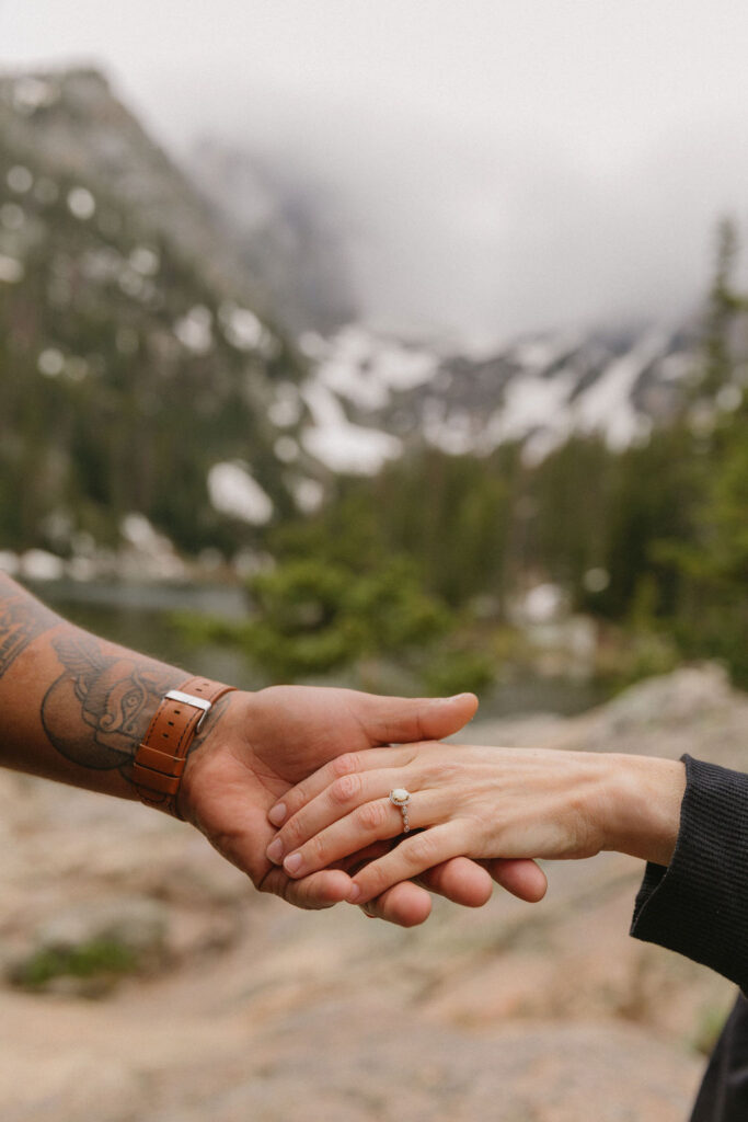 dreamy and romantic dream lake engagement photos at rocky mountain national park