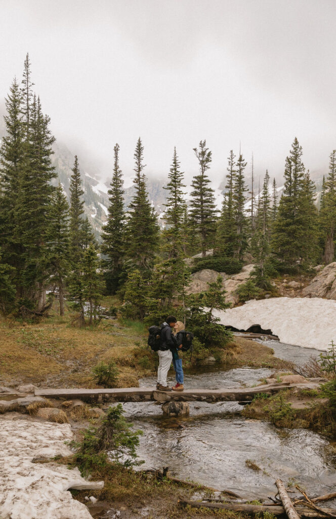 Adventurous hiking couple colorado engagement session in Rocky Mountain National Park