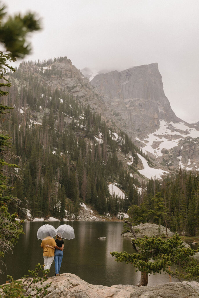 adventurous hiking engagement photos in dream lake, rocky mountain national park