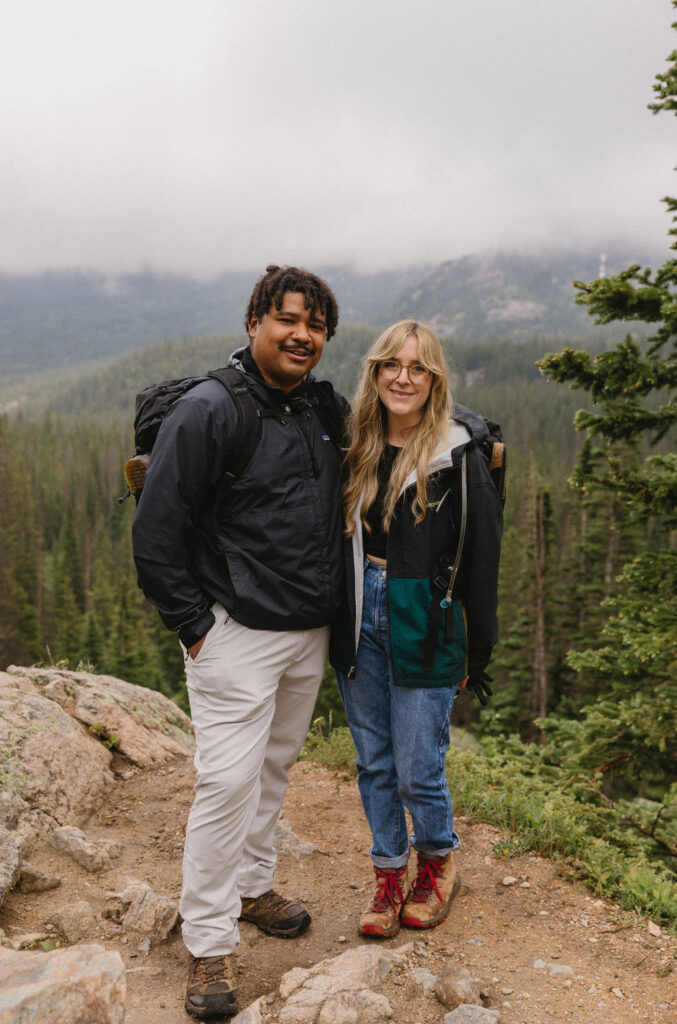 adventurous hiking engagement photos in dream lake, rocky mountain national park