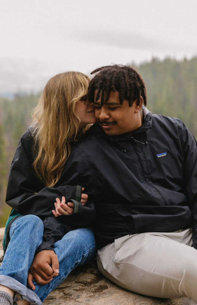 adventurous hiking engagement photos in dream lake, rocky mountain national park