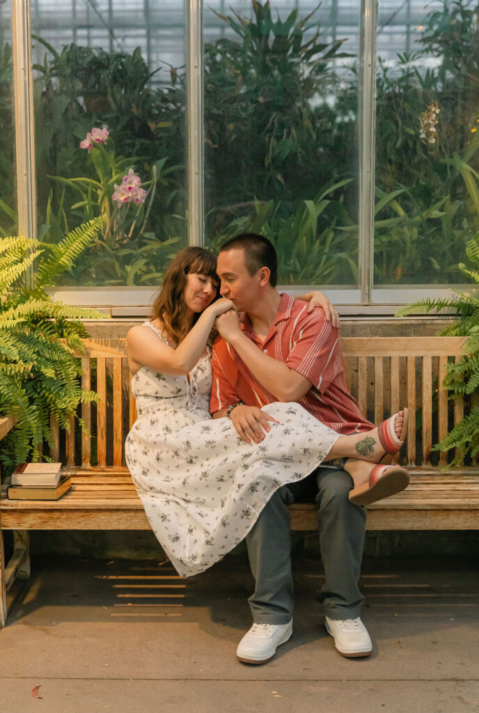 Enchanting greenhouse engagement photos in Denver